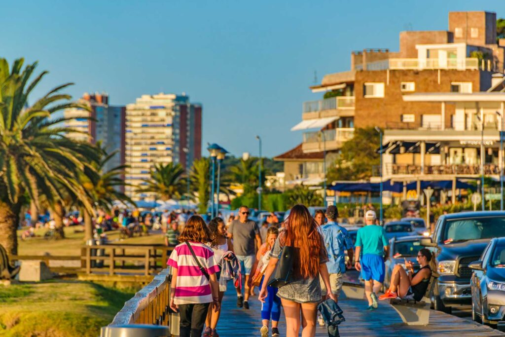 People walking in mansa beach in punta del este uruguay
