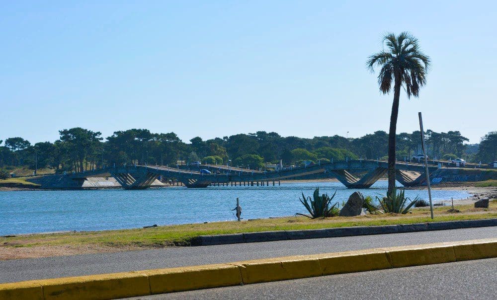 Bridge with waves and river in Uruguay